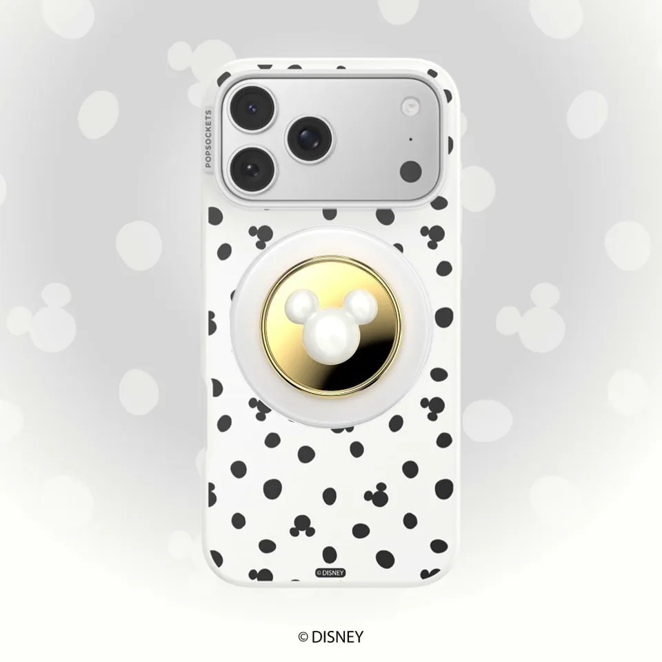 Gold Mickey PopSockets grip on a white Mickey-dot case